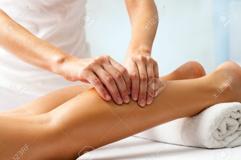 44607445 detail of hands massaging human calf muscle therapist applying pressure on female leg  768x512